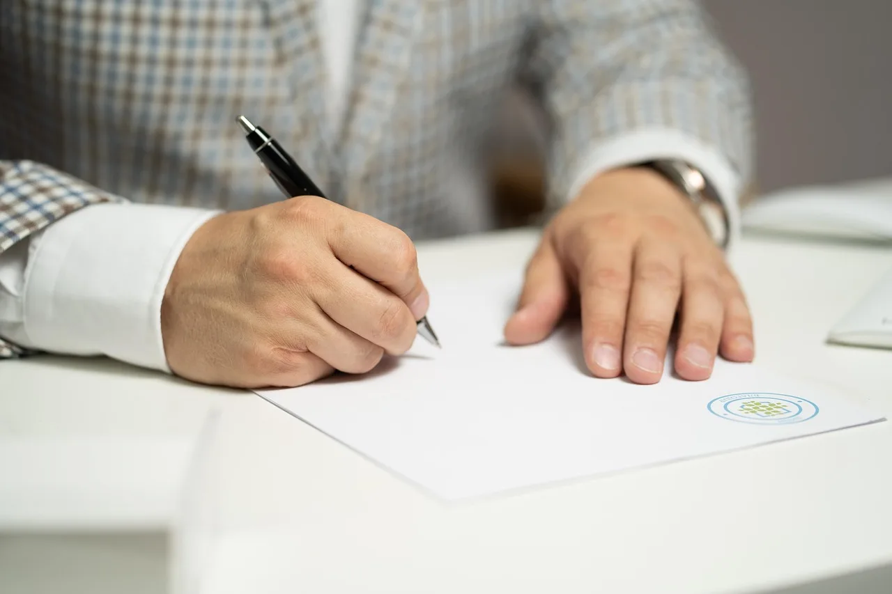 man, sign, paper, write, document, contract, signing, agreement, signature, signing document, signing contract, signing paper, sign, contract, contract, contract, contract, contract, signing, agreement, signature, signature. Programmatic advertising agencies compared on incentives, not pitch decks