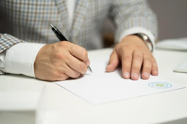 man, sign, paper, write, document, contract, signing, agreement, signature, signing document, signing contract, signing paper, sign, contract, contract, contract, contract, contract, signing, agreement, signature, signature. Programmatic advertising agencies compared on incentives, not pitch decks
